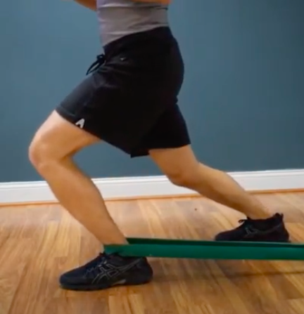 Band ankle mobilization with the knee moving forward over the toes