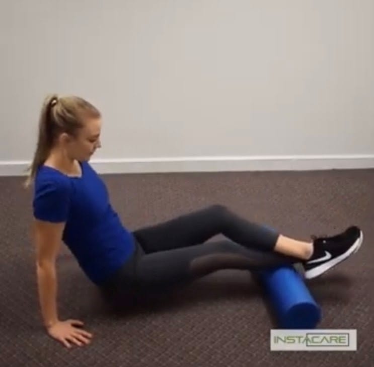 Foam rolling the calf muscles